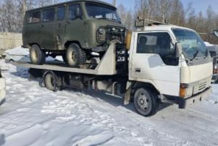 Эвакуатор Mitsubishi Canter в г. Иркутск со сдвижной платформой и лебедкой