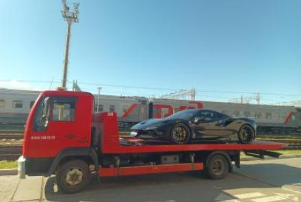 Эвакуатор Man L2000 в г. Сочи со сдвижной платформой, лебедкой и подкатными